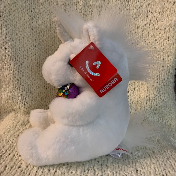 Aurora plush white unicorn with shiny multicoloured heart. - Picture 2 of 7